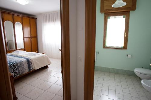 Ένα ή περισσότερα κρεβάτια σε δωμάτιο στο La Casa del Gelso Fiorito