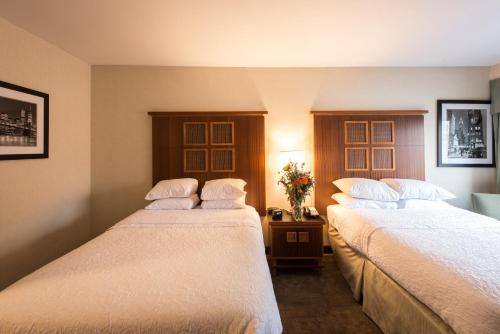 Łóżko lub łóżka w pokoju w obiekcie SoHo 54