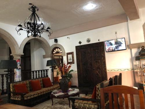 TV a/nebo společenská místnost v ubytování Hotel Refugio Victoria