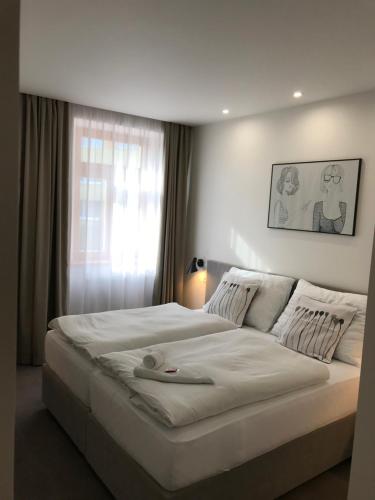 Rozmaryn Hotel B&Bにあるベッド