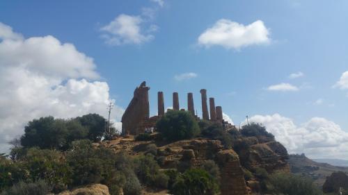 a view of a mountain with a statue on top at Casa Villaggio Pirandello in Agrigento