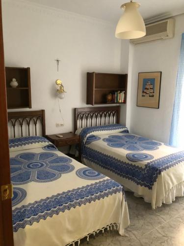 A bed or beds in a room at Peso de la Harina - piso completo