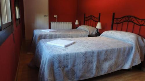 Ένα ή περισσότερα κρεβάτια σε δωμάτιο στο Aparthotel Can Gallart