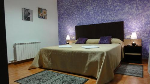 Ένα ή περισσότερα κρεβάτια σε δωμάτιο στο Aparthotel Can Gallart