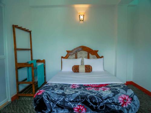 Postel nebo postele na pokoji v ubytování Namadi Nest home stay