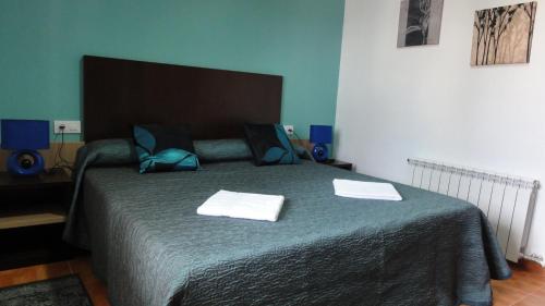 Ένα ή περισσότερα κρεβάτια σε δωμάτιο στο Aparthotel Can Gallart