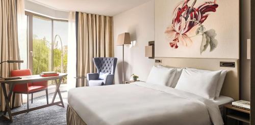 Кровать или кровати в номере Hyatt Regency Amsterdam