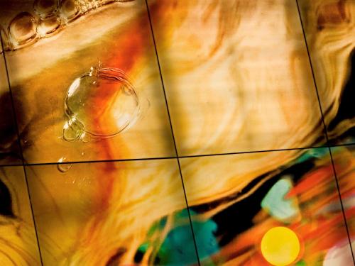 a close up of a tiled wall with a bubble at SO/ Vienna in Vienna