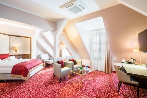 Postel nebo postele na pokoji v ubytování Best Western Plus Hotel StadtPalais
