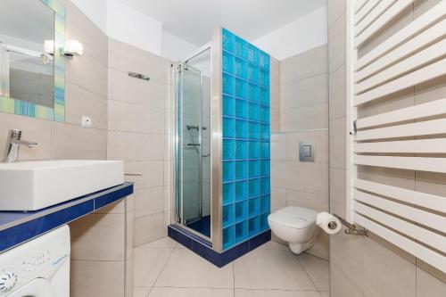 Koupelna v ubytování Apartament Sunrise Spacerowa by Noclegi Renters