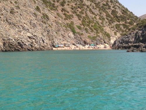 a body of water with a beach in the background at Villa Laura in Nebida