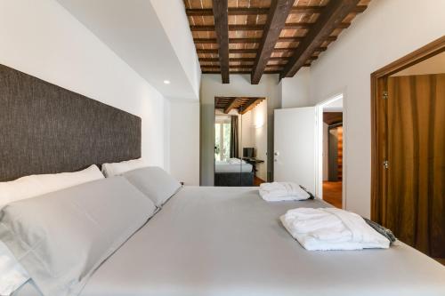 Säng eller sängar i ett rum på Corte livia Room & Breakfast