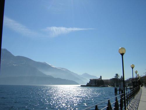 a view of a body of water with mountains in the background at B&B La Cà De La Frà in Gravedona