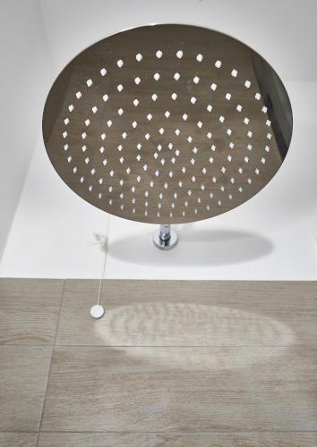 a chair with white polka dots on it at Aerie Esmeralda in Como