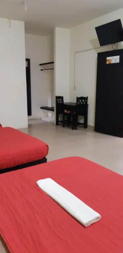 Ένα ή περισσότερα κρεβάτια σε δωμάτιο στο Hotel Zepeda