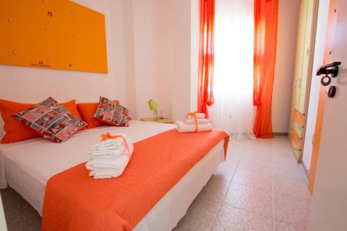 מיטה או מיטות בחדר ב-Villa Vincenza