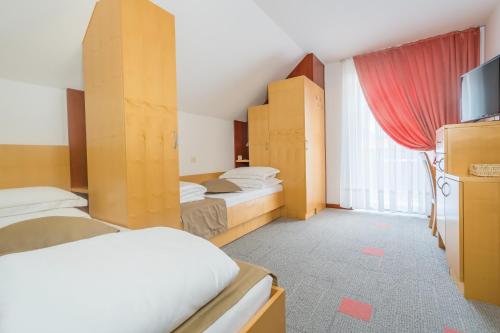 Postel nebo postele na pokoji v ubytování Villa Nena