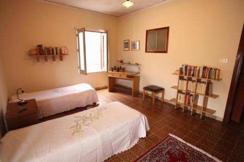 Posteľ alebo postele v izbe v ubytovaní Casa Vacanze Botteghelle