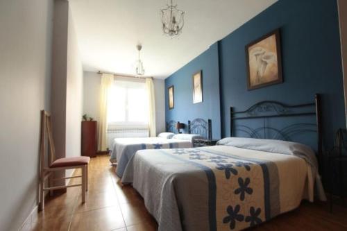 Postel nebo postele na pokoji v ubytování Casa Rural Ribera del Duero