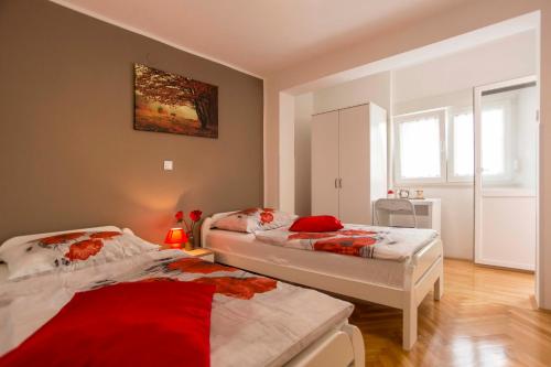 Postel nebo postele na pokoji v ubytování Apartman Barbara