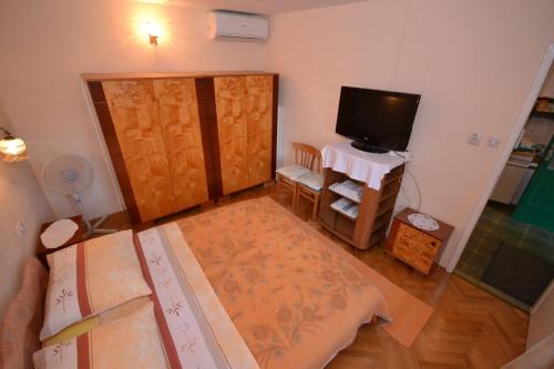 Ένα ή περισσότερα κρεβάτια σε δωμάτιο στο Apartments Kat - 80 m from beach