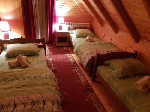 Postelja oz. postelje v sobi nastanitve Guest house Anka