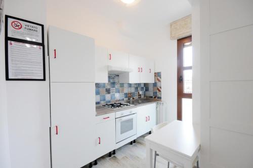 A kitchen or kitchenette at Cortesia 4