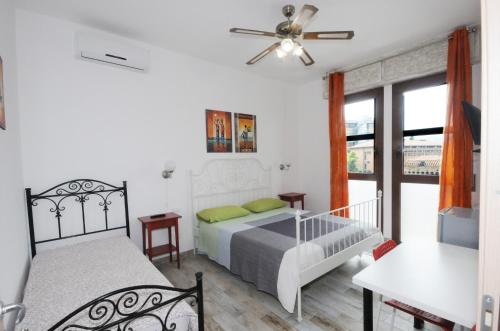 A bed or beds in a room at Cortesia 4