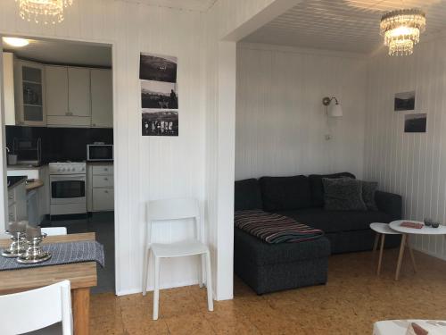 A seating area at Vellir Grenivík Home with a View