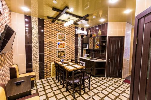 Μια τηλεόραση ή/και κέντρο ψυχαγωγίας στο Apartment Hotel