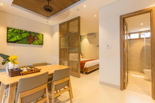 Ένα ή περισσότερα κρεβάτια σε δωμάτιο στο Tam House Villa Hotel