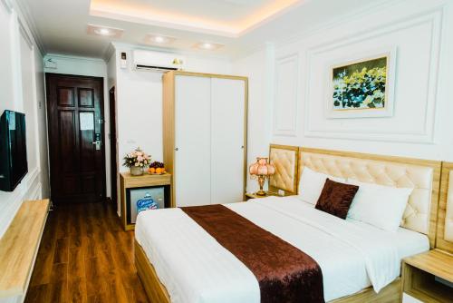Katil atau katil-katil dalam bilik di Vu Linh Hotel