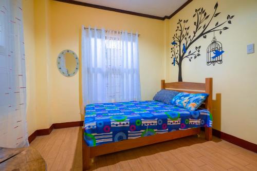 Postel nebo postele na pokoji v ubytování Joval Homestay