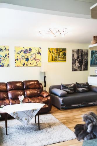 Posezení v ubytování Raimondas Apartments