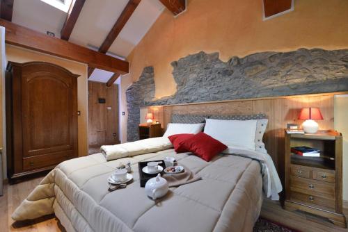 Un pat sau paturi într-o cameră la Lo Barba