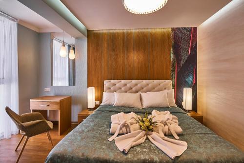 Postel nebo postele na pokoji v ubytování Light Hotel