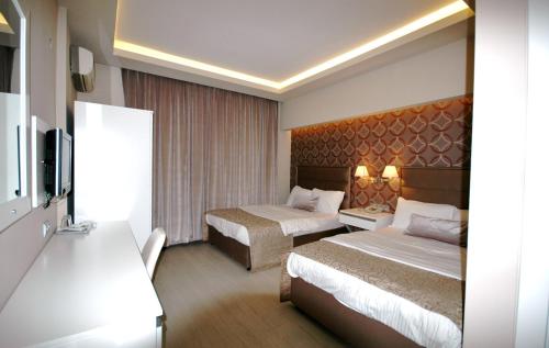 Kent Hotelにあるベッド