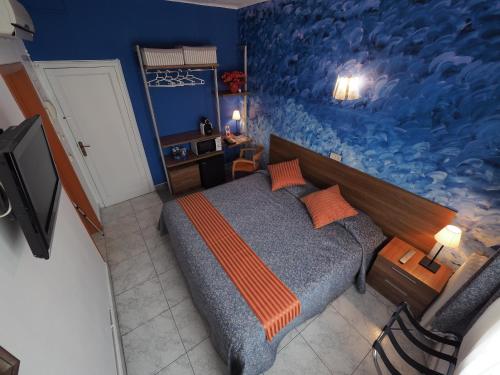 Ένα ή περισσότερα κρεβάτια σε δωμάτιο στο Hotel Montserrat