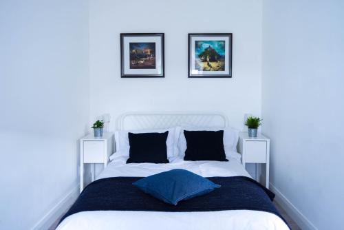 Llit o llits en una habitació de Amica Guesthouse