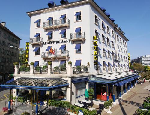
a large building with a large window on the side of it at Hotel Montbrillant in Geneva
