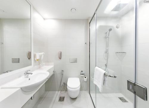 Koupelna v ubytování Citymax Hotel Ras Al Khaimah