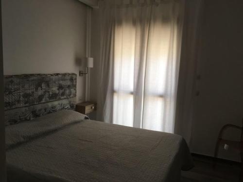 Una cama o camas en una habitación de Traiano Suite
