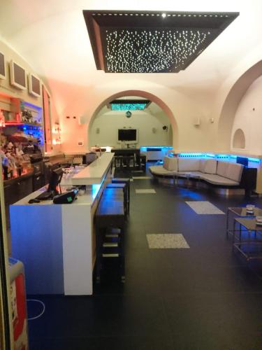 a living room with a couch and a table at Seven Hostel & Rooms in Sant'Agnello