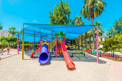 a playground in a park with a slide at VONRESORT Golden Beach & Aqua - Kids Concept-Ultra All Inclusive in Side
