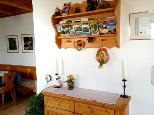 a room with two candles on a wall at Ferienhof Kriechbaumer in Schönau im Mühlkreis