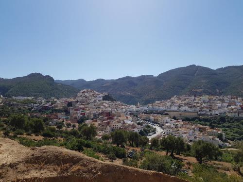 a view of a city from a hill at Dar Zerhoune in Moulay Idriss Zerhoun
