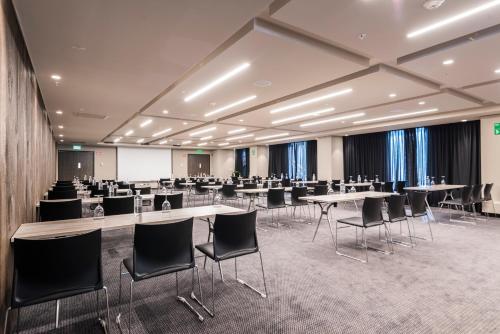 A área empresarial e/ ou a sala de conferências de Movich Hotel Las Lomas