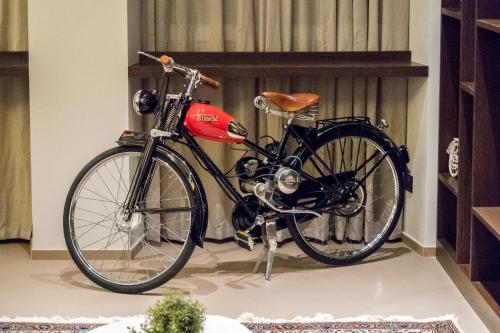 a bicycle is parked in a room at Hotel San Giovanni Roma in Rome