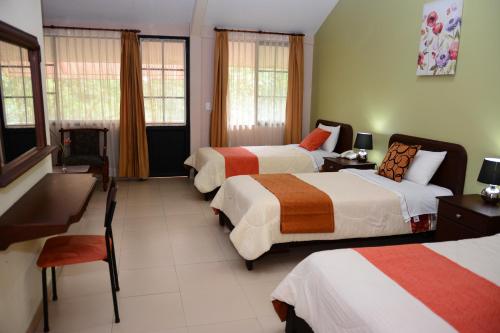 Katil atau katil-katil dalam bilik di Hostal La Molienda