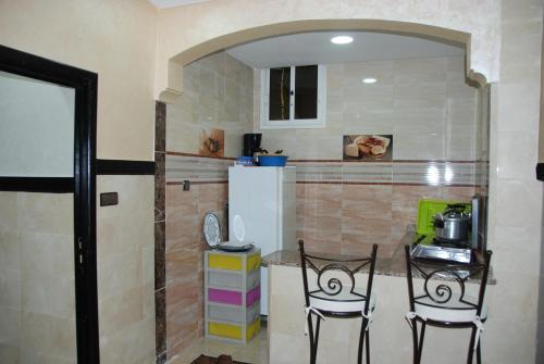 Cuisine ou kitchenette dans l'établissement Appartements Ziad Guéliz